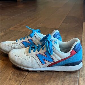 New Balance White, Blue, And Red Sneakers